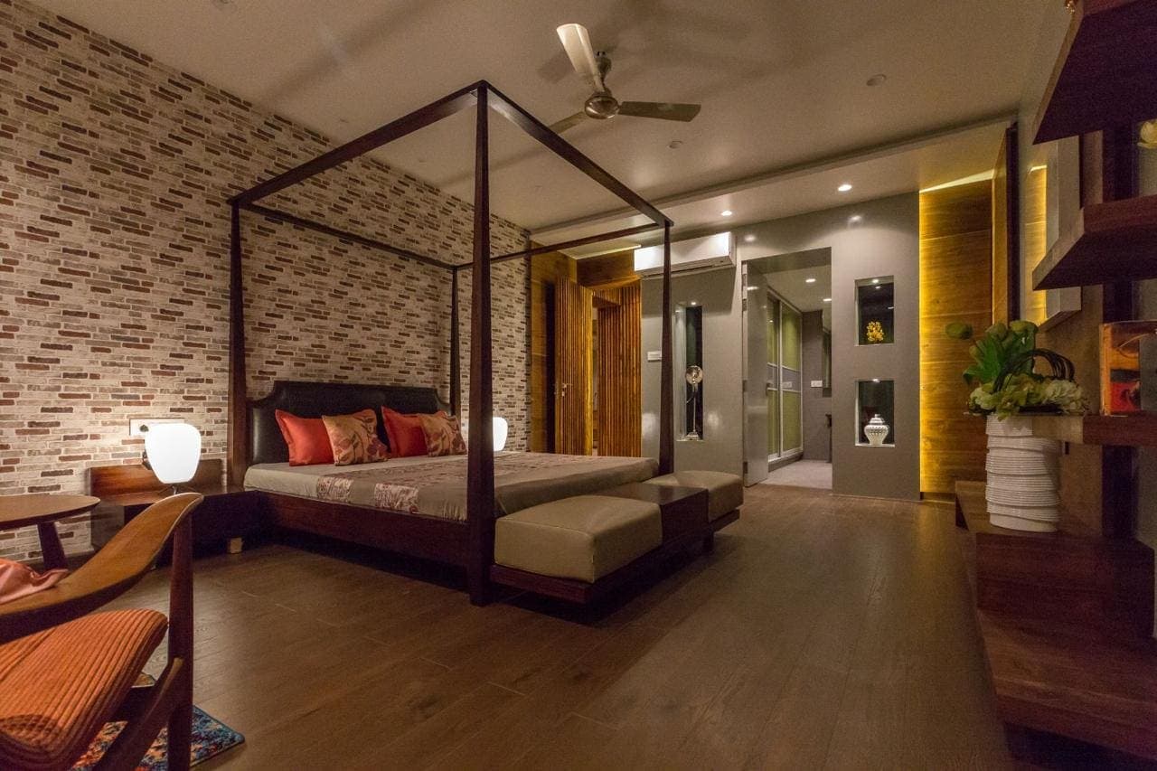 Villa interior with open-plan living and full-height glazing