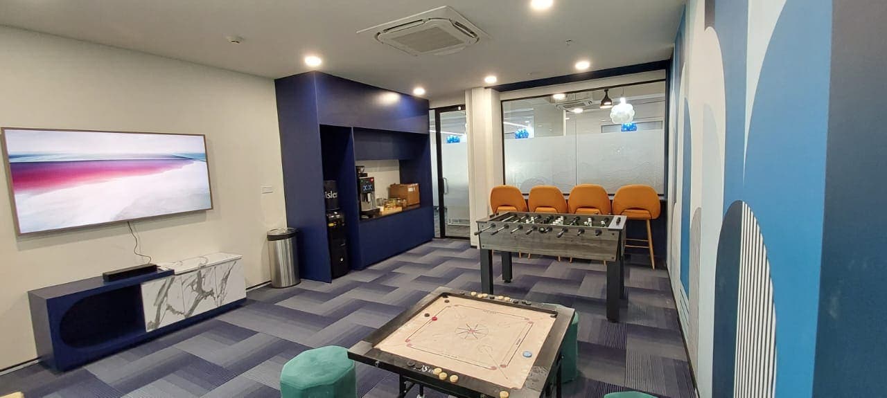Completed open-plan office floor with meeting rooms and workstations