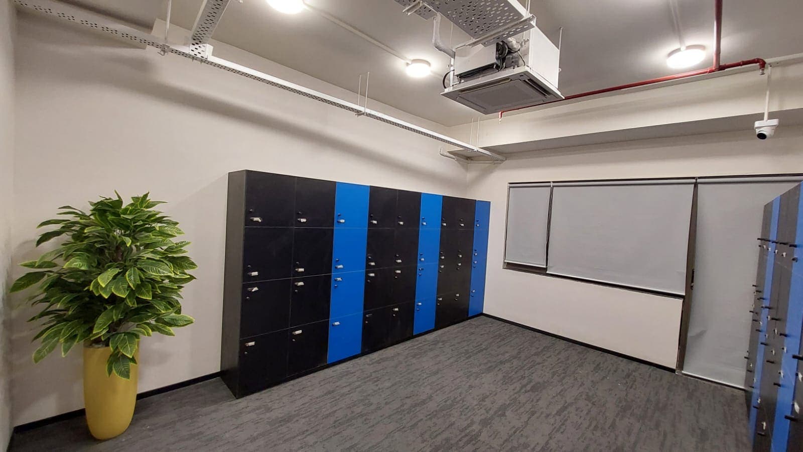 Office storage and pantry units built into a circulation zone