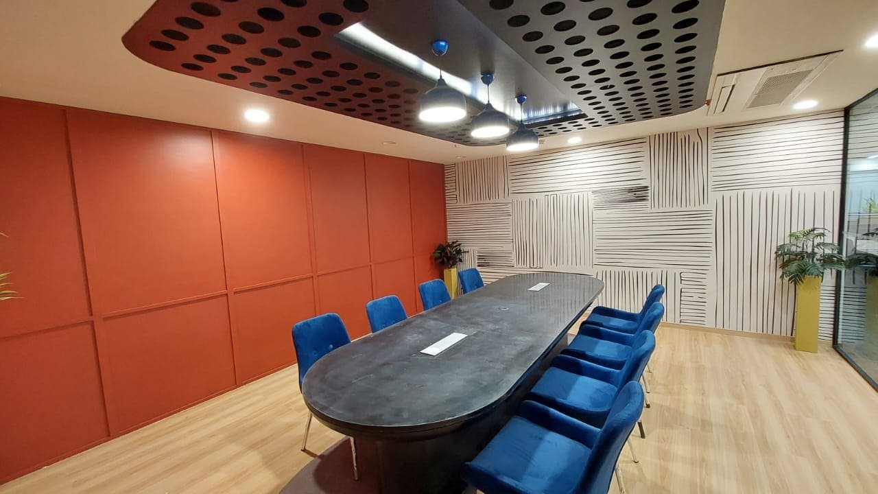 Office reception with feature joinery wall and seating