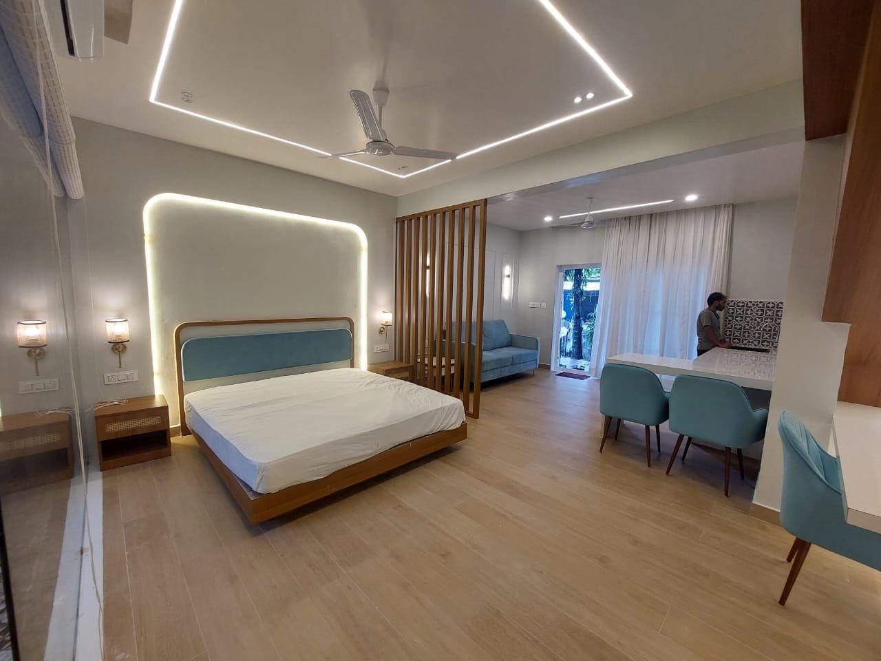 Hotel guest room with bedside joinery and integrated lighting